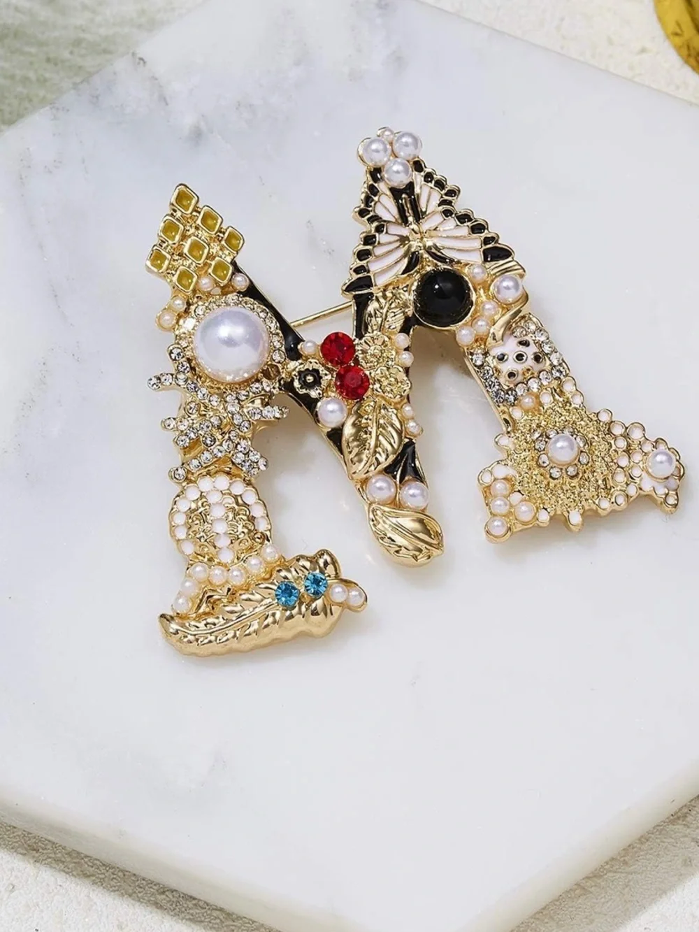 Anthropologie ornate gold